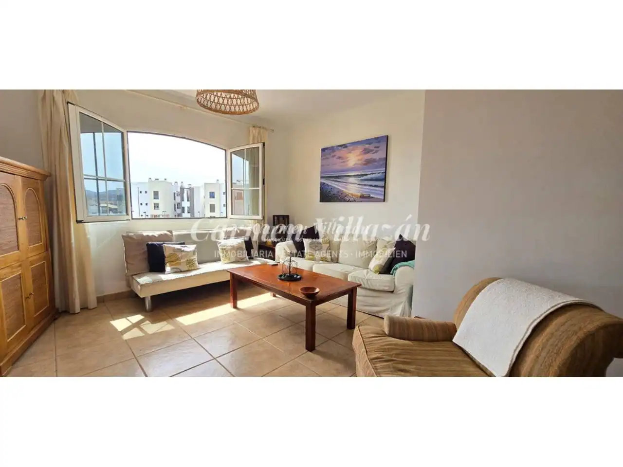 Sala de estar de Apartamento en venta en Antigua con Amueblado, Balcón y Piscina comunitaria
