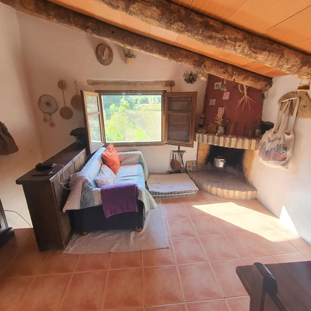Sala d'estar de Finca rústica en venda en Caseres amb Moblat