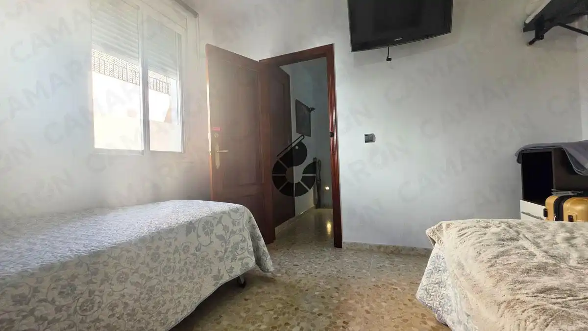 Habitación de Casa adosada en venta en Coria del Río con Aire acondicionado, Parquet y Terraza