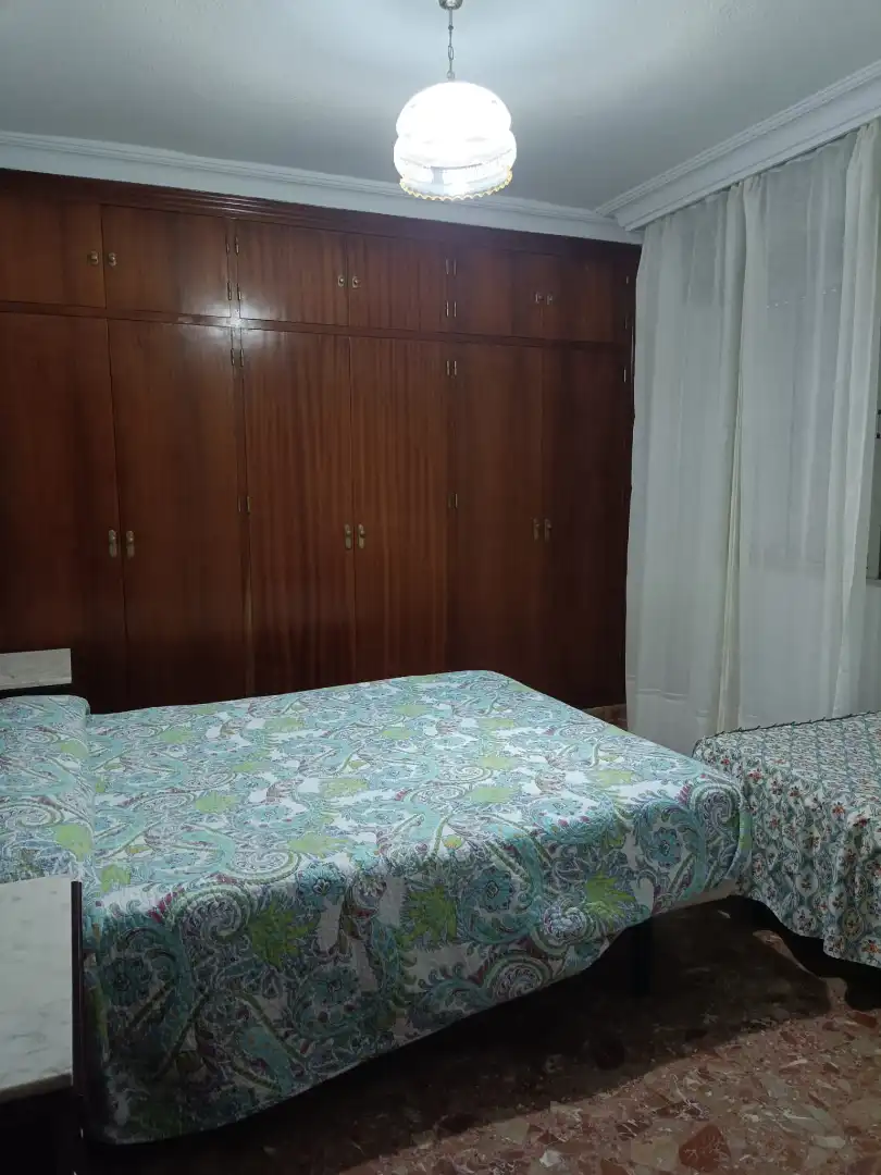 Schlafzimmer von Dachboden zum Verkauf in Punta Umbría mit Terrasse, Möbliert und Ofen