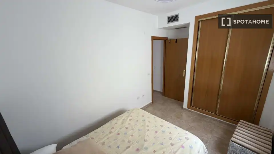 Dormitori de Apartament per a compartir en Málaga amb Aire condicionat, Terrassa i Moblat