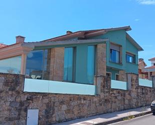 Vista exterior de Casa o xalet en venda en Sanxenxo amb Terrassa i Piscina