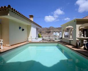 Swimming pool of Attic for sale in Mogán  with Air Conditioner, Terrace and Swimming Pool