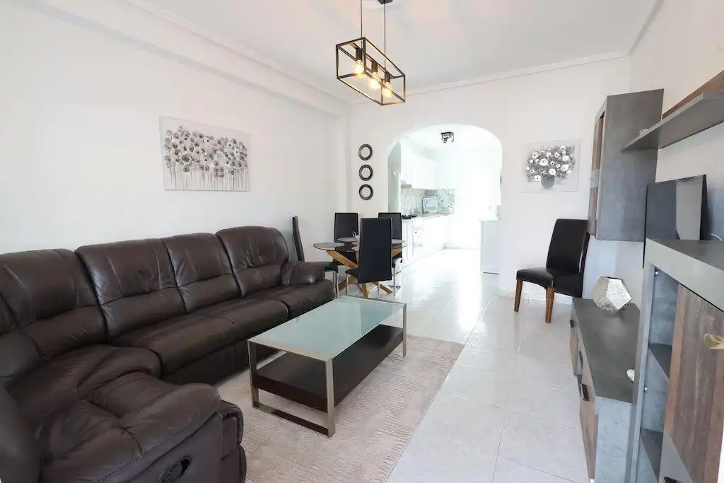 Sala d'estar de Casa adosada en venda en Rojales amb Terrassa, Traster i Piscina
