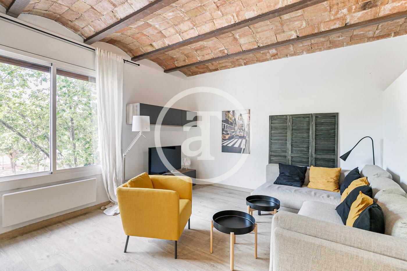 Sala d'estar de Estudi de lloguer en  Barcelona Capital amb Calefacció, Moblat i Forn