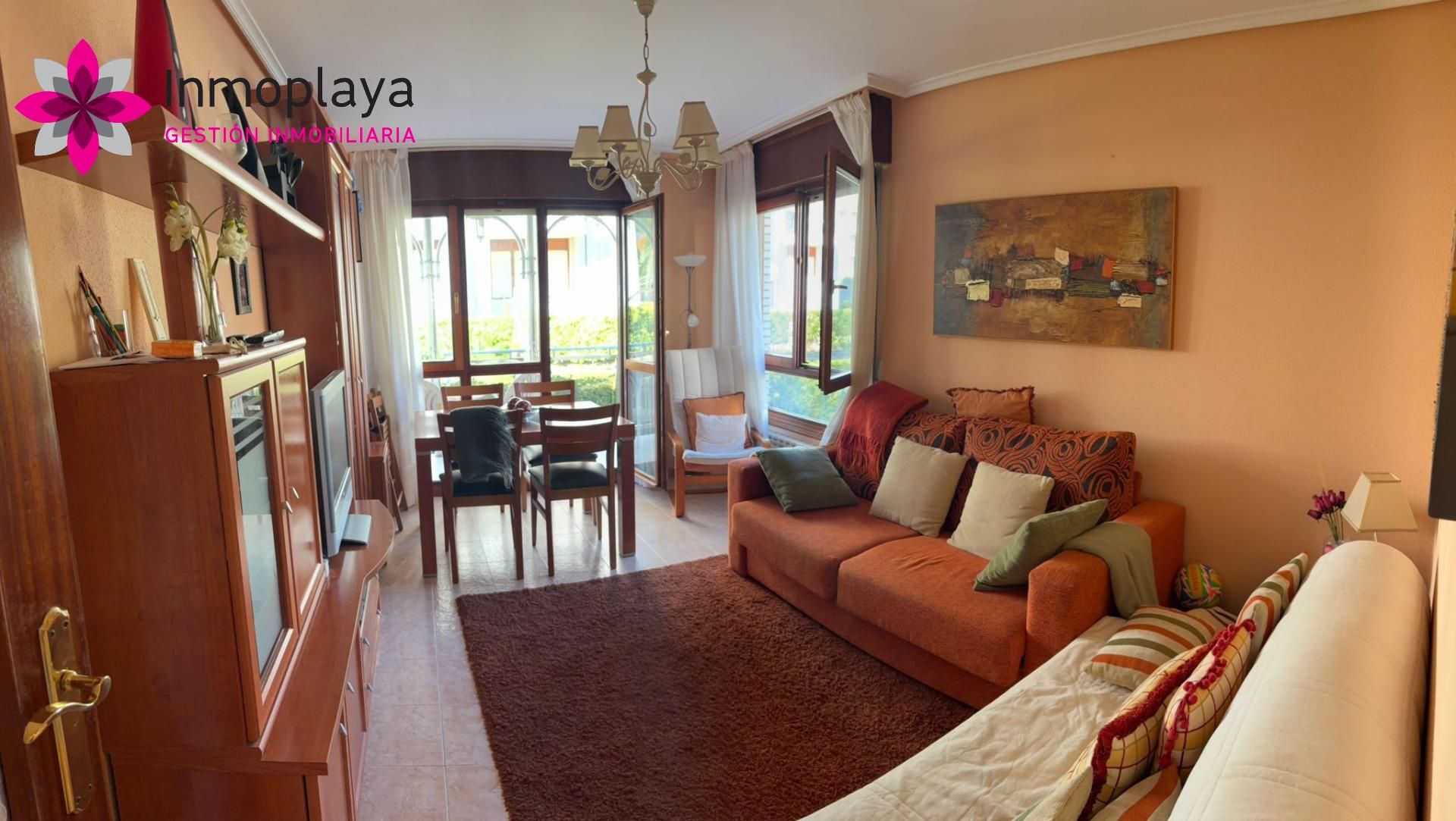Living room of Planta baja for sale in Noja  with Terrace, Balcony and Community pool