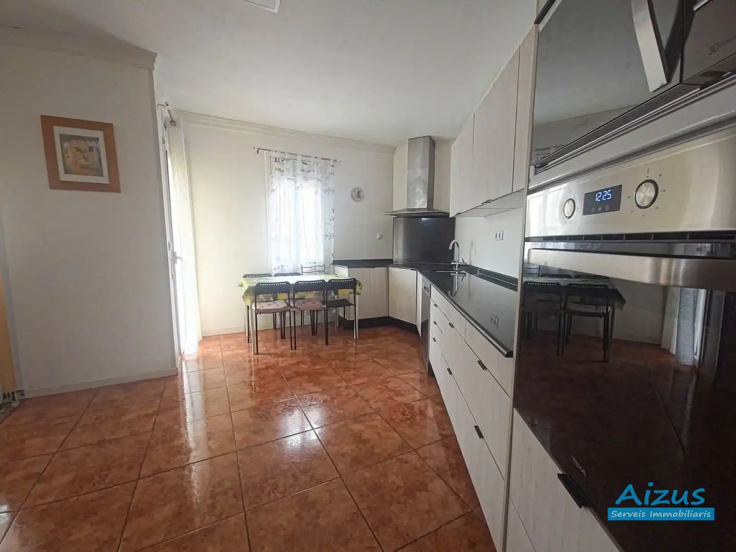 Cuina de Casa adosada en venda en Ripollet amb Aire condicionat, Calefacció i Forn