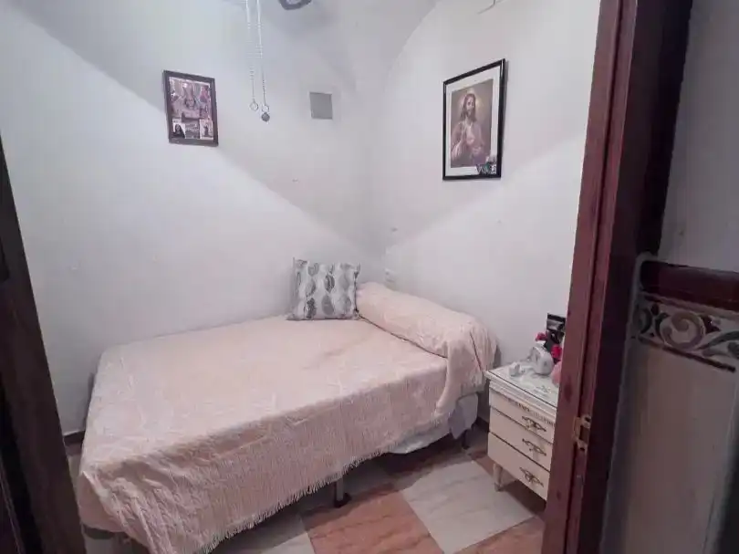 Dormitori de Casa adosada en venda en Alcuéscar amb Balcó