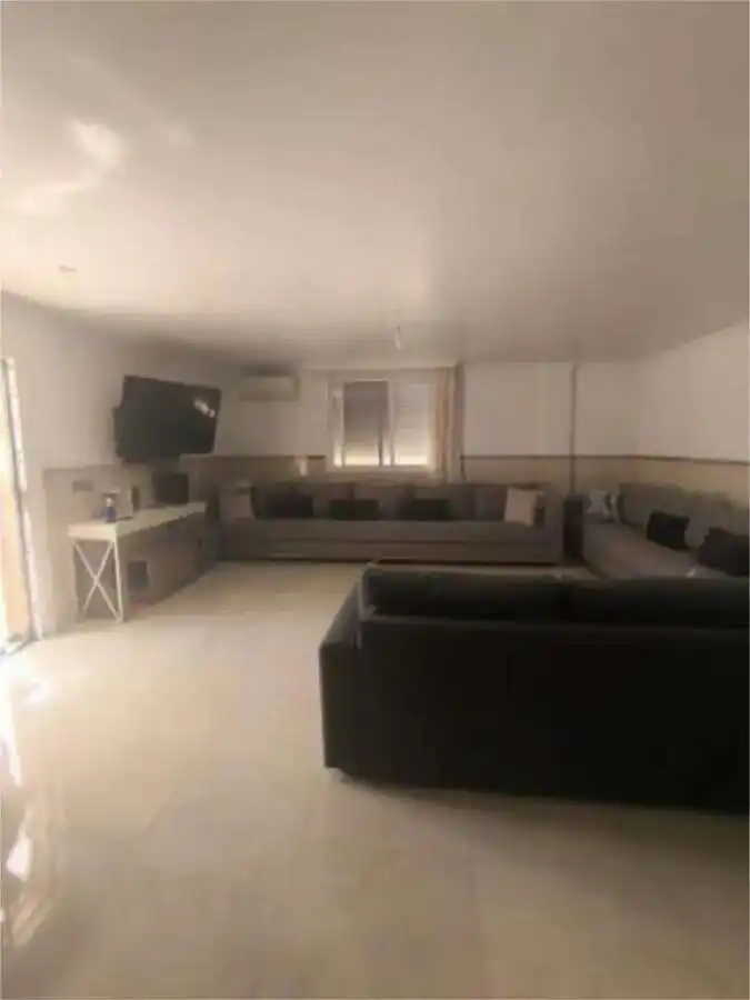 Sala d'estar de Casa o xalet en venda en Málaga
