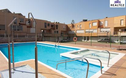 Swimming pool of Single-family semi-detached for sale in  Almería Capital  with Terrace and Balcony