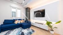 Living room of Flat for sale in  Madrid Capital  with Air Conditioner, Heating and Balcony