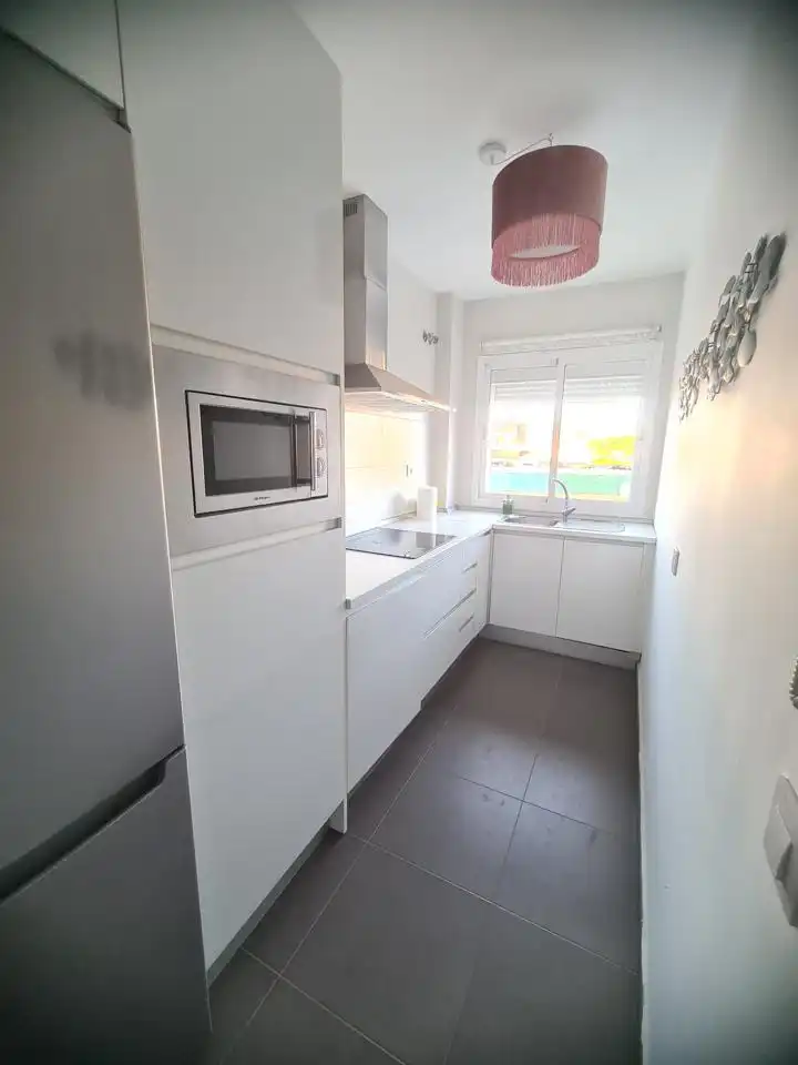 Kitchen of Flat for sale in Sanlúcar de Barrameda  with Air Conditioner, Terrace and Swimming Pool