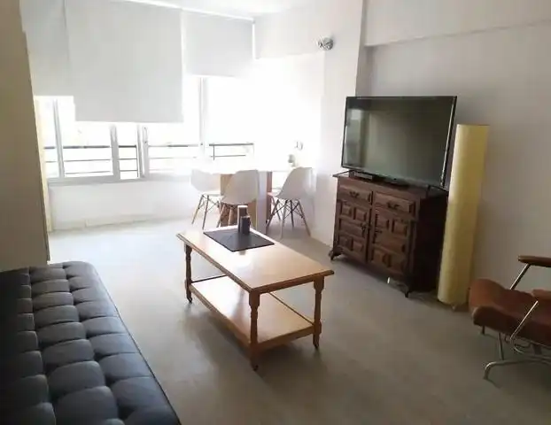 Sala de estar de Apartamento en venta en Benidorm con Amueblado y Piscina comunitaria