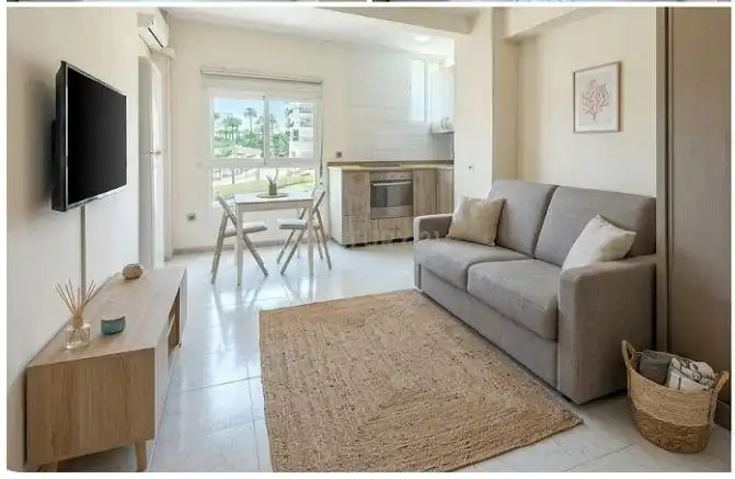 Sala de estar de Estudio en venta en Mijas con Jardín privado y Piscina comunitaria