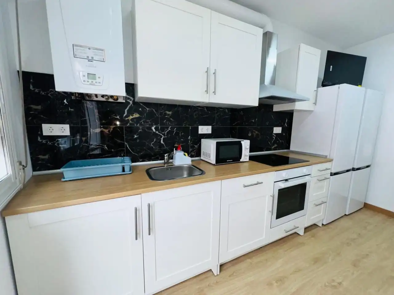 Kitchen of Flat for share in Ourense Capital   with Heating, Furnished and Balcony