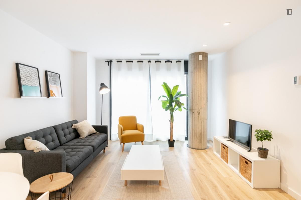 Sala d'estar de Apartament de lloguer en  Barcelona Capital amb Aire condicionat, Calefacció i Moblat