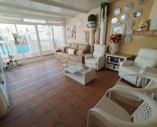 Living room of Single-family semi-detached for sale in Amposta  with Air Conditioner, Terrace and Swimming Pool