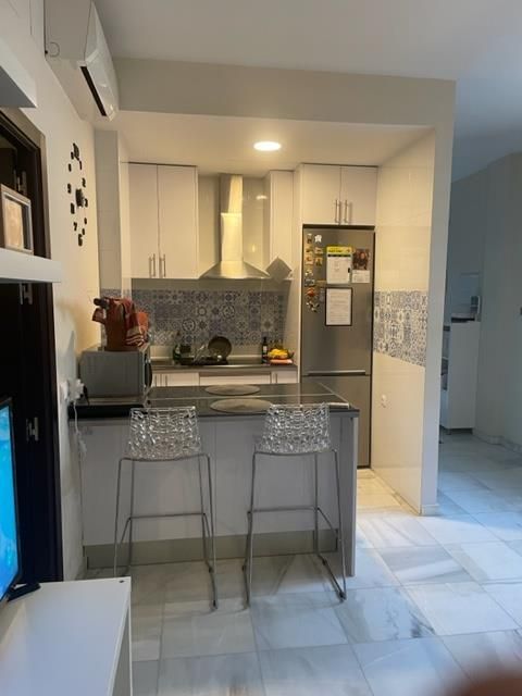 Kitchen of Apartment for sale in  Sevilla Capital  with Air Conditioner, Heating and Furnished