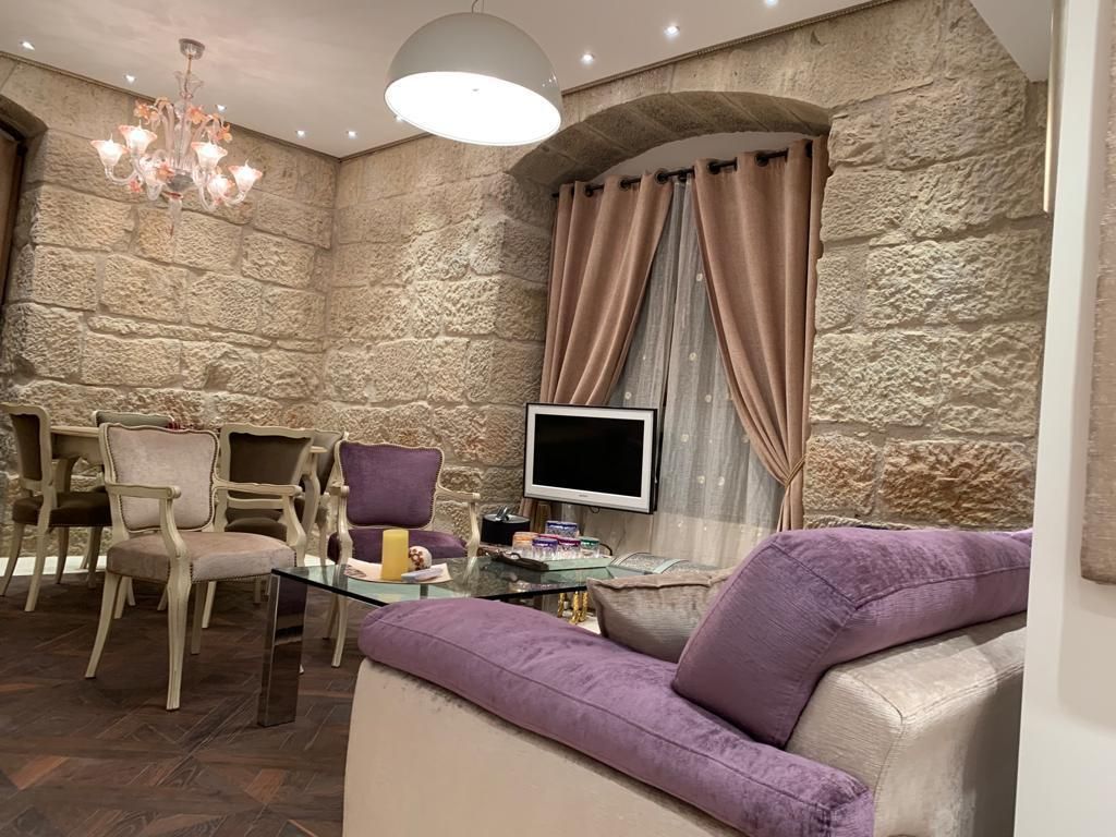 Sala d'estar de Apartament en venda en Loporzano amb Aire condicionat, Moblat i Alarma