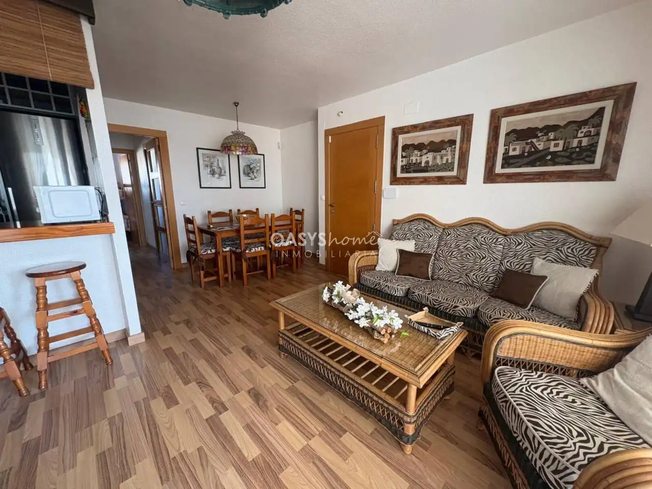 Sala de estar de Piso en venta en La Manga del Mar Menor con Terraza, Amueblado y Piscina comunitaria