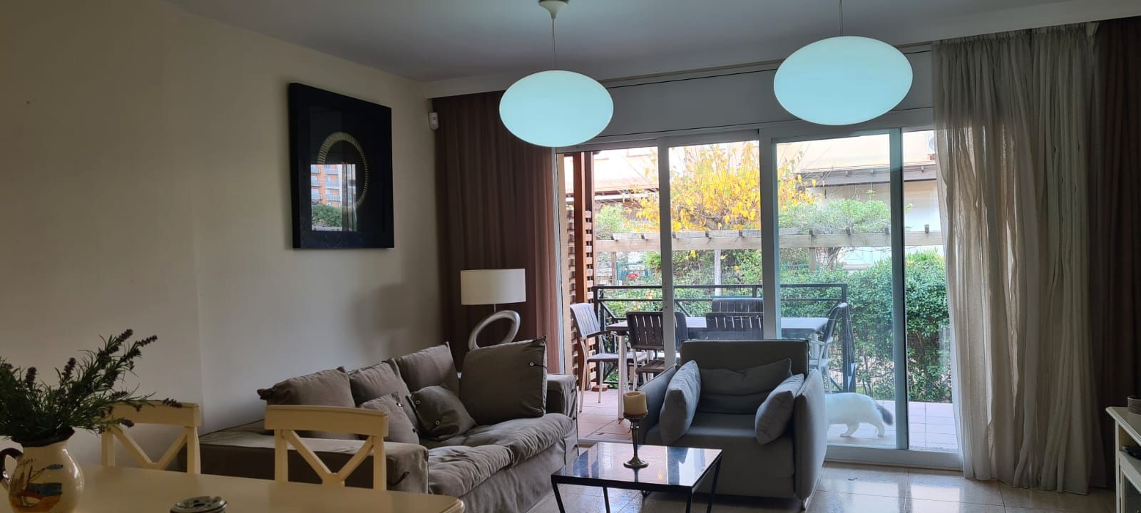 Sala d'estar de Casa adosada en venda en Calafell amb Aire condicionat, Calefacció i Jardí privat