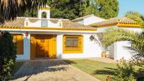 Exterior view of House or chalet for sale in Sanlúcar la Mayor  with Air Conditioner, Heating and Private garden