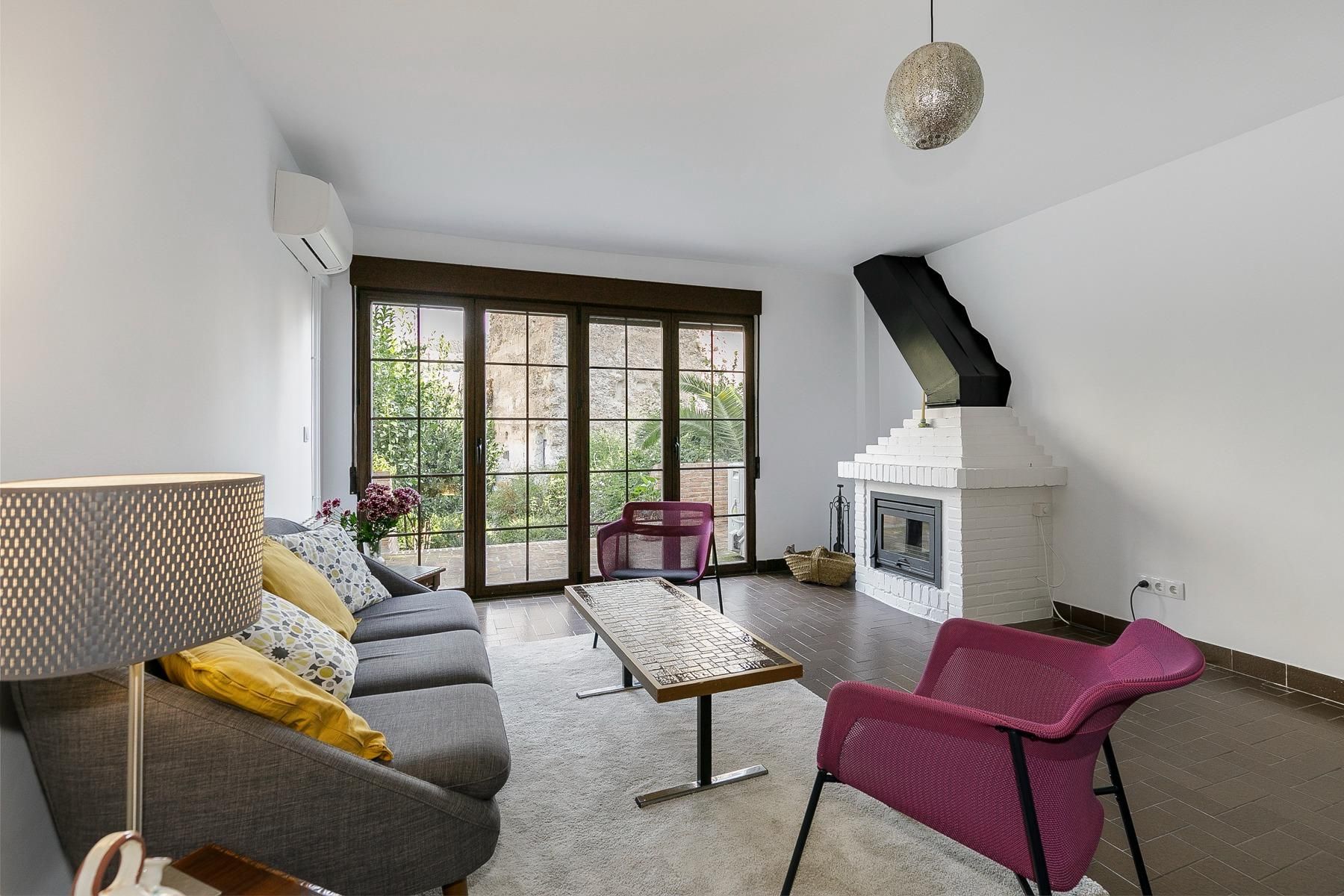 Sala d'estar de Casa o xalet en venda en  Granada Capital amb Aire condicionat, Calefacció i Jardí privat