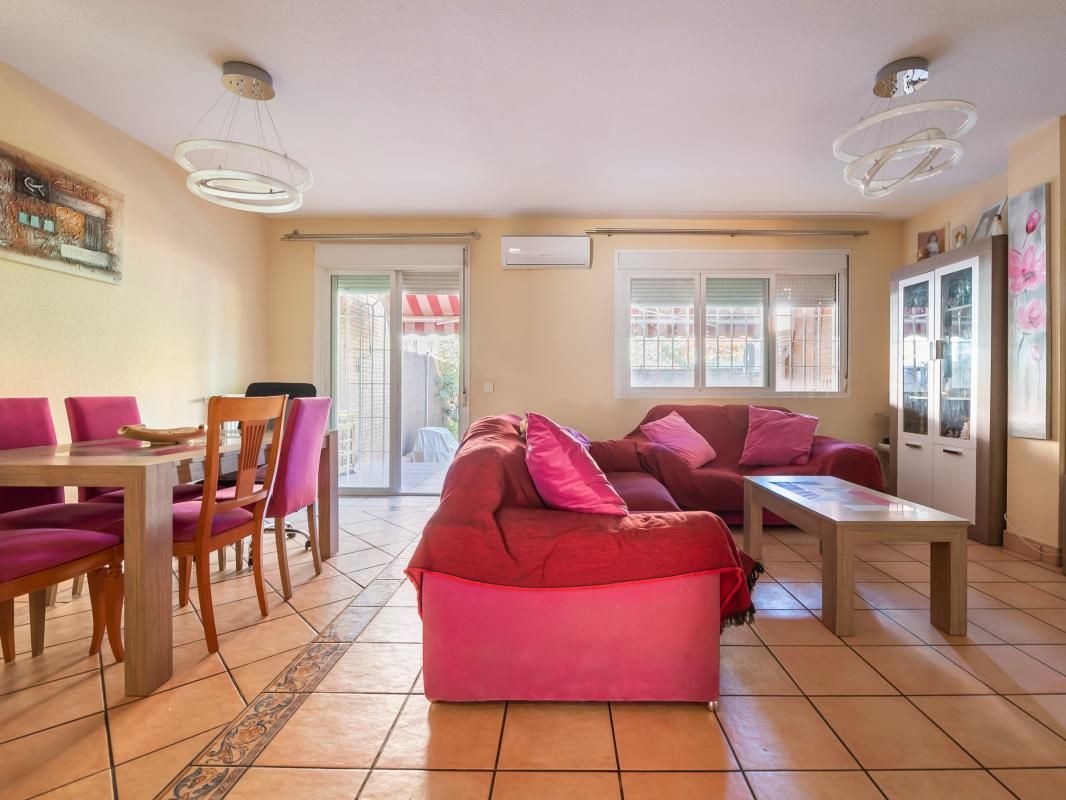 Sala d'estar de Casa adosada en venda en Leganés amb Aire condicionat, Calefacció i Jardí privat