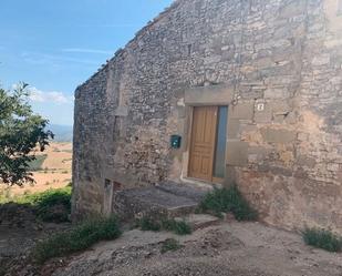 Außenansicht von Einfamilien-Reihenhaus zum verkauf in Sant Guim de la Plana mit Privatgarten, Abstellraum und Fernseher