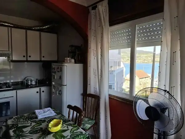Cuina de Apartament en venda en Moaña amb Calefacció, Parquet i Traster