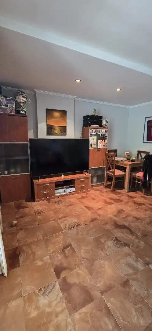 Sala de estar de Casa adosada en venta en El Portil con Calefacción, Trastero y Amueblado