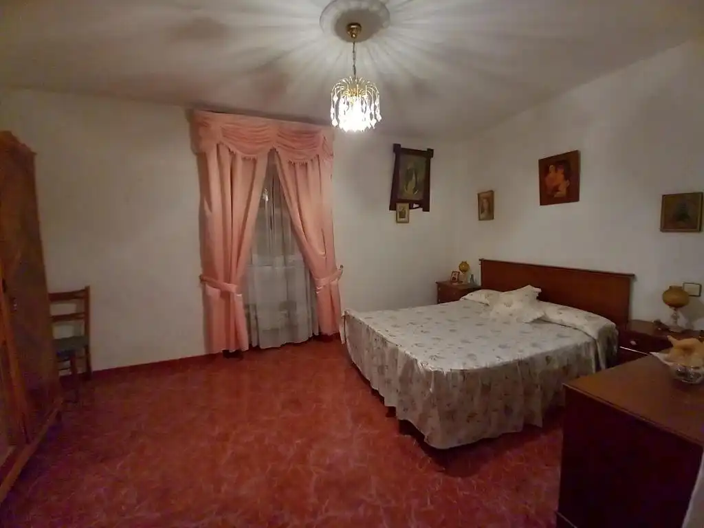 Habitación de Casa adosada en venta en Martos con Terraza y Amueblado