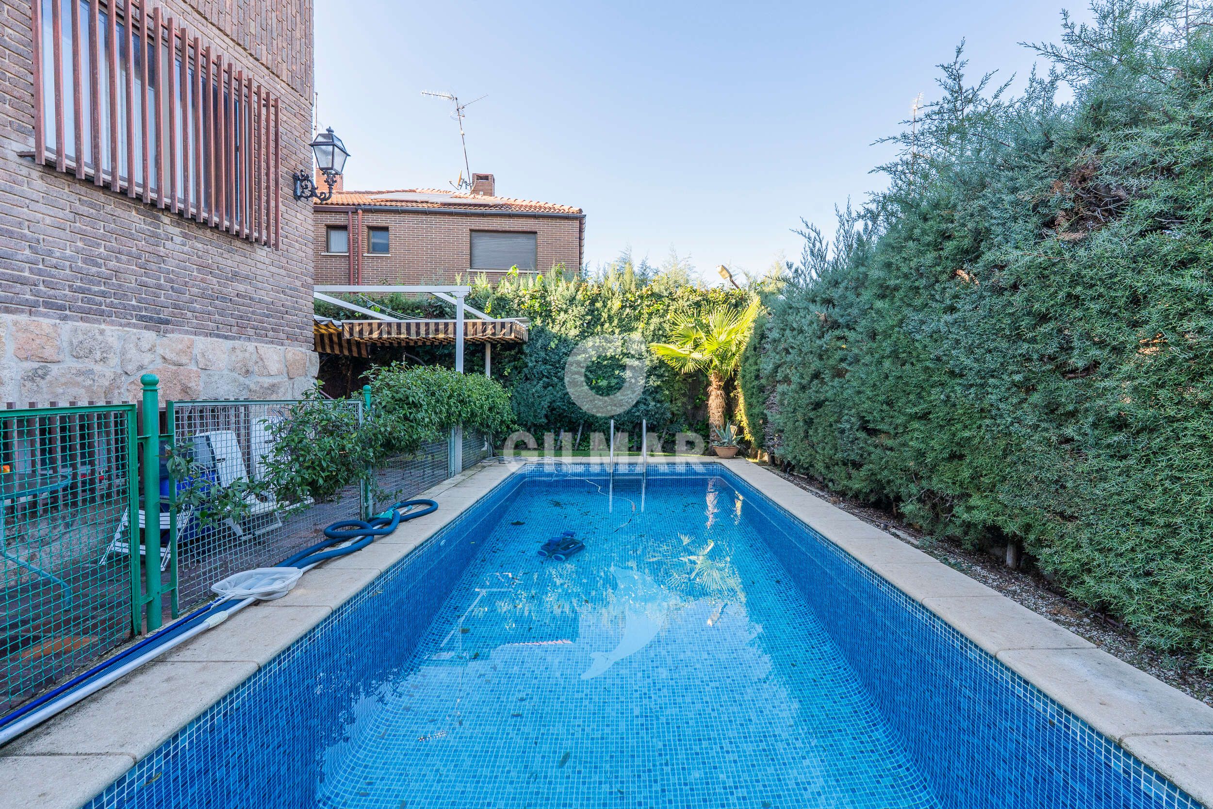 Swimming pool of Single-family semi-detached for sale in  Madrid Capital  with Heating, Private garden and Swimming Pool