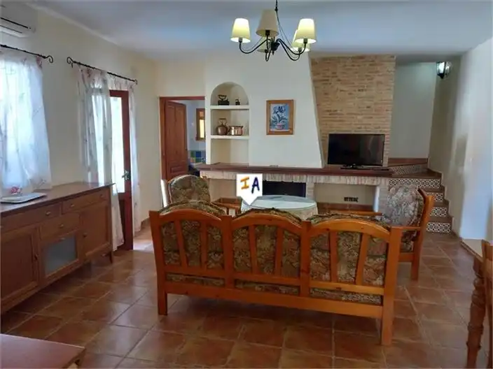 Sala de estar de Casa adosada en venta en Priego de Córdoba con Aire acondicionado, Terraza y Piscina