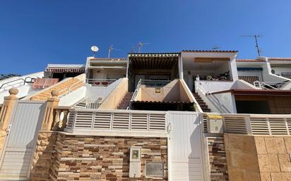 Vista exterior de Casa o xalet en venda en Roquetas de Mar amb Aire condicionat i Terrassa