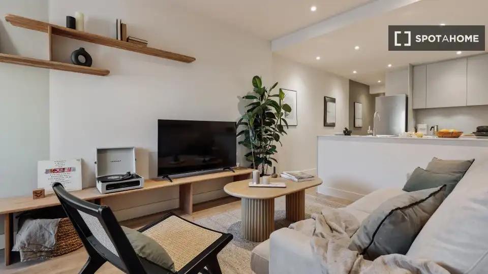 Sala de estar de Apartamento para compartir en Barcelona con Aire acondicionado, Terraza y Amueblado