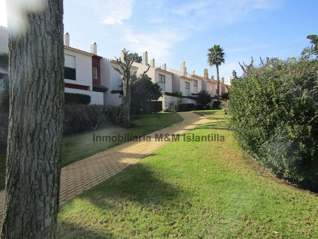 Vista exterior de Casa adosada en venta en Islantilla con Jardín privado, Terraza y Amueblado