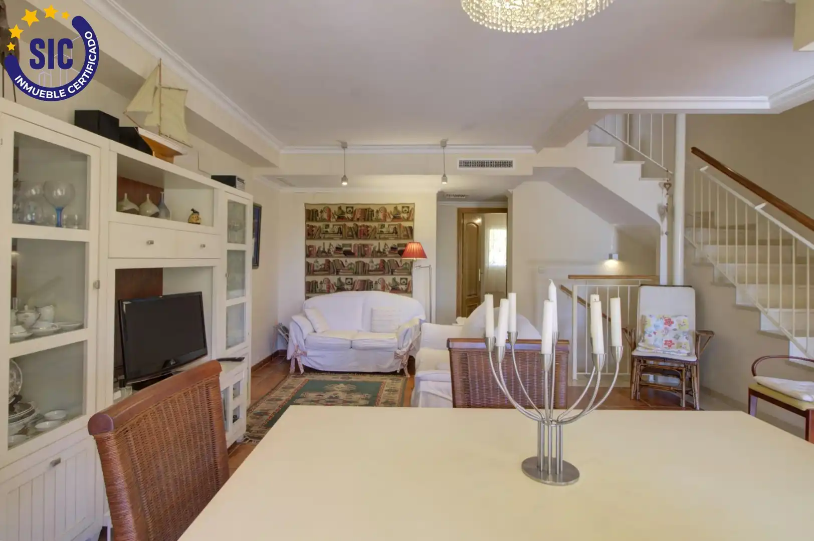 Sala d'estar de Casa adosada en venda en Sagunto / Sagunt amb Aire condicionat, Calefacció i Jardí privat