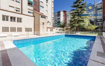 Swimming pool of Flat for sale in  Granada Capital  with Air Conditioner, Heating and Private garden