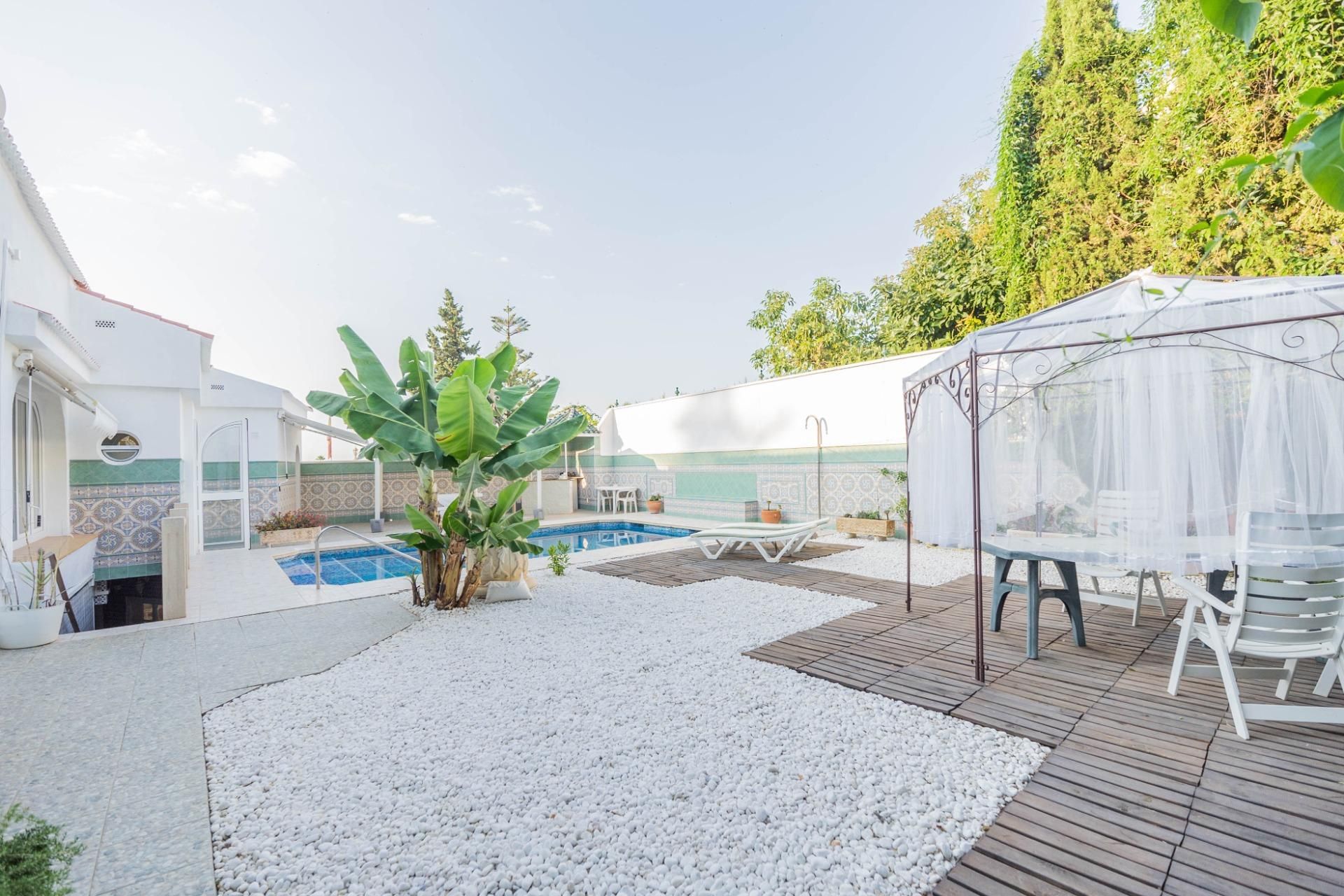Swimming pool of House or chalet for sale in Benalmádena  with Air Conditioner, Heating and Private garden