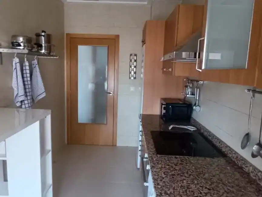Cocina de Estudio de alquiler en Sant Joan d'Alacant con Aire acondicionado, Jardín privado y Piscina