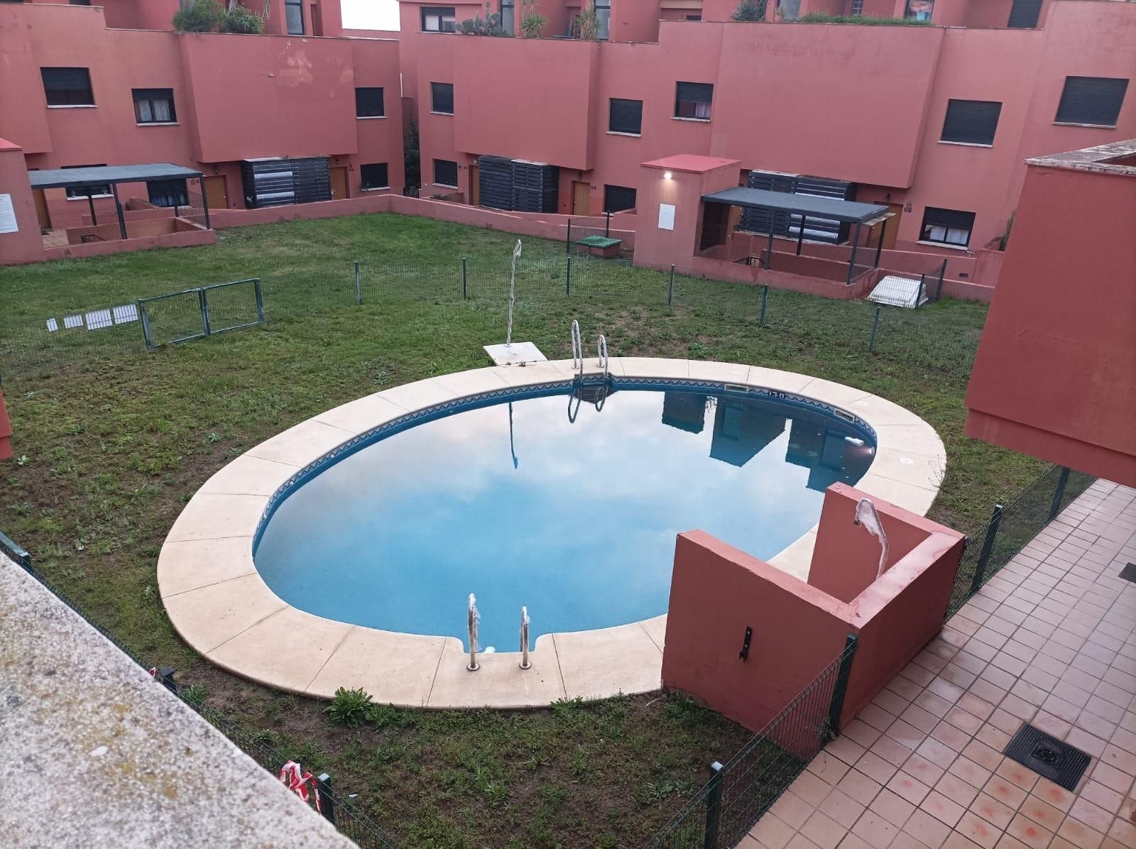 Swimming pool of Apartment for sale in Guillena  with Air Conditioner, Terrace and Community pool