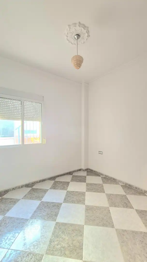 Habitación de Casa adosada en venta en Alcolea del Río con Alarma