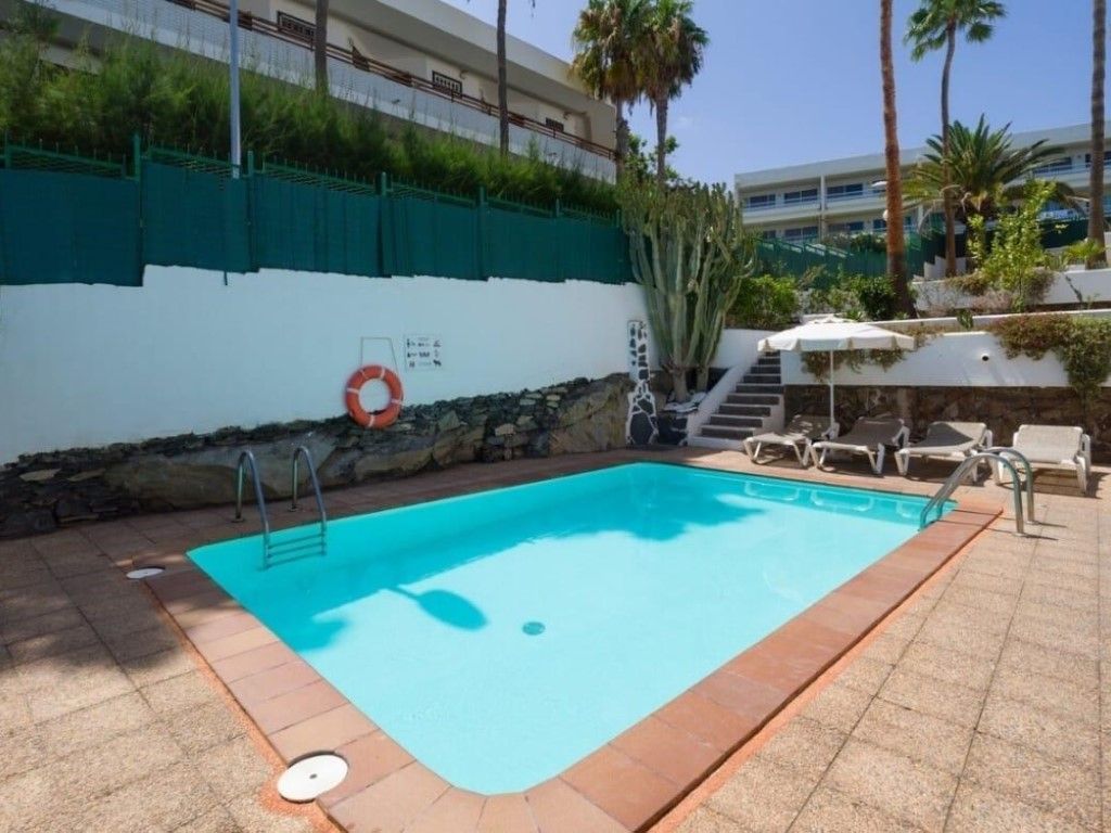 Piscina de Apartament de lloguer en San Bartolomé de Tirajana