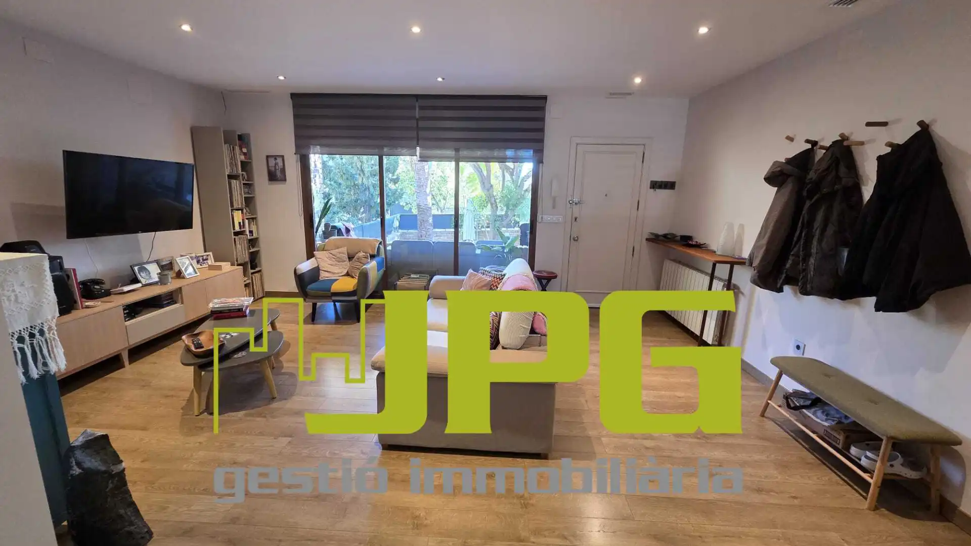 Sala de estar de Casa adosada en venta en Sant Joan d'Alacant con Aire acondicionado, Calefacción y Jardín privado