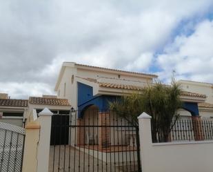 Vista exterior de Casa adosada en venda en San Javier amb Aire condicionat, Jardí privat i Moblat