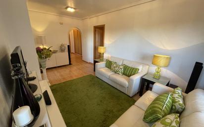 Sala d'estar de Apartament en venda en La Manga del Mar Menor amb Aire condicionat, Piscina i Moblat