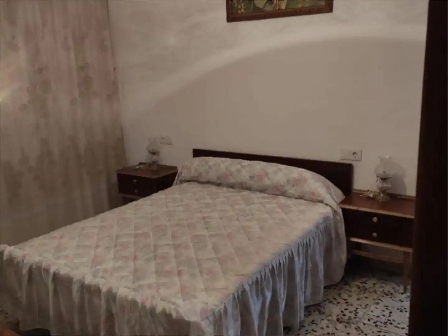 Dormitori de Casa adosada en venda en Guadix amb Balcó