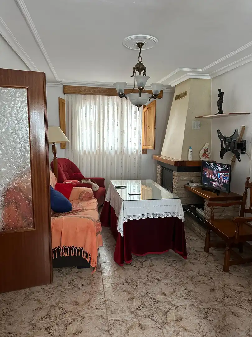 Sala d'estar de Casa adosada en venda en Urrácal amb Terrassa, Traster i Moblat