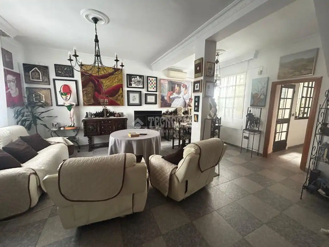 Sala de estar de Casa adosada en venta en Huelva con Aire acondicionado